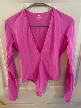 SKIMS vibrant pink bodysuit